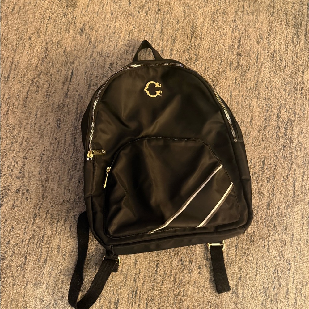 C. Wonder Black Backpack with Gold Accents